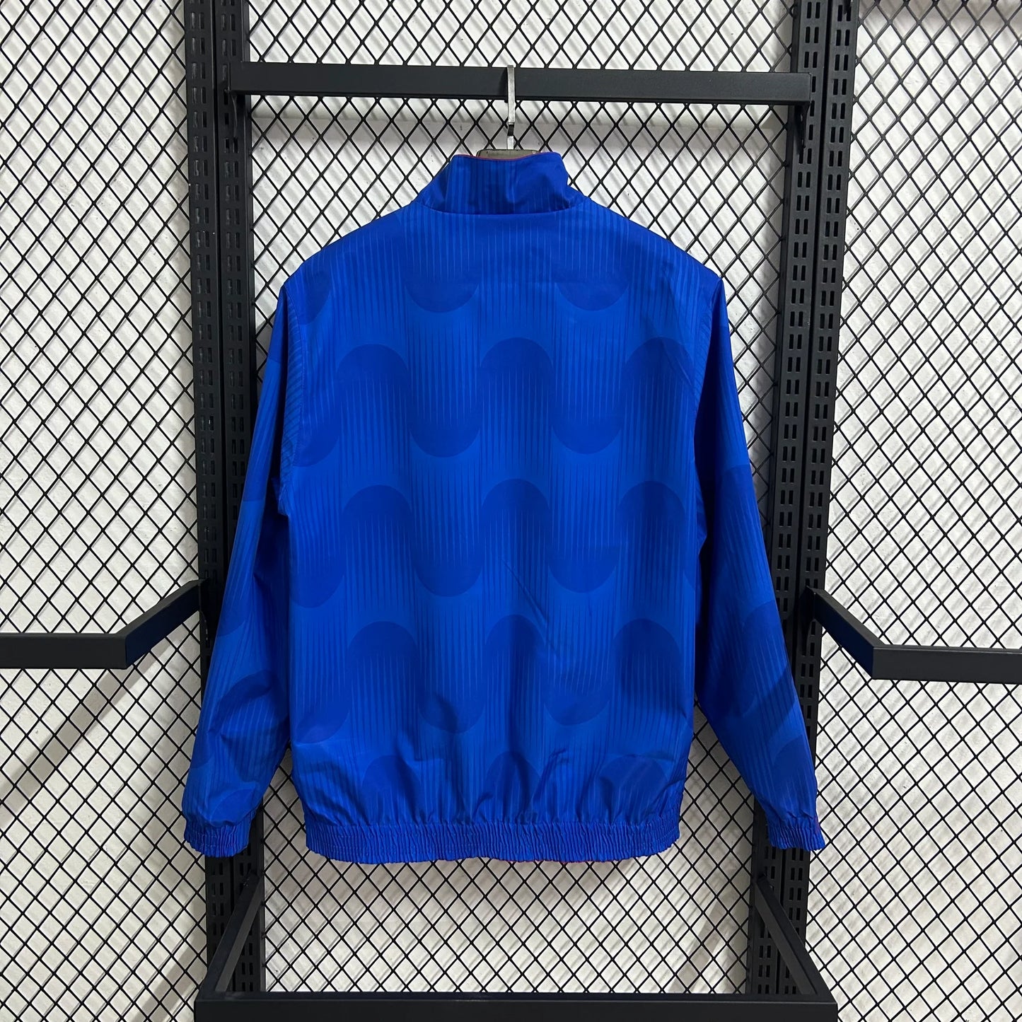 2026 España Cortavientos reversible rojo y azul S-2XL