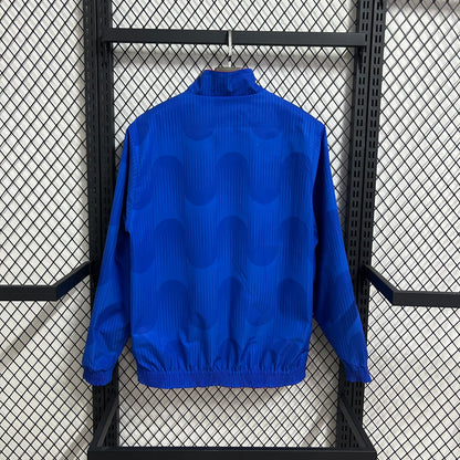 2026 España Cortavientos reversible rojo y azul S-2XL