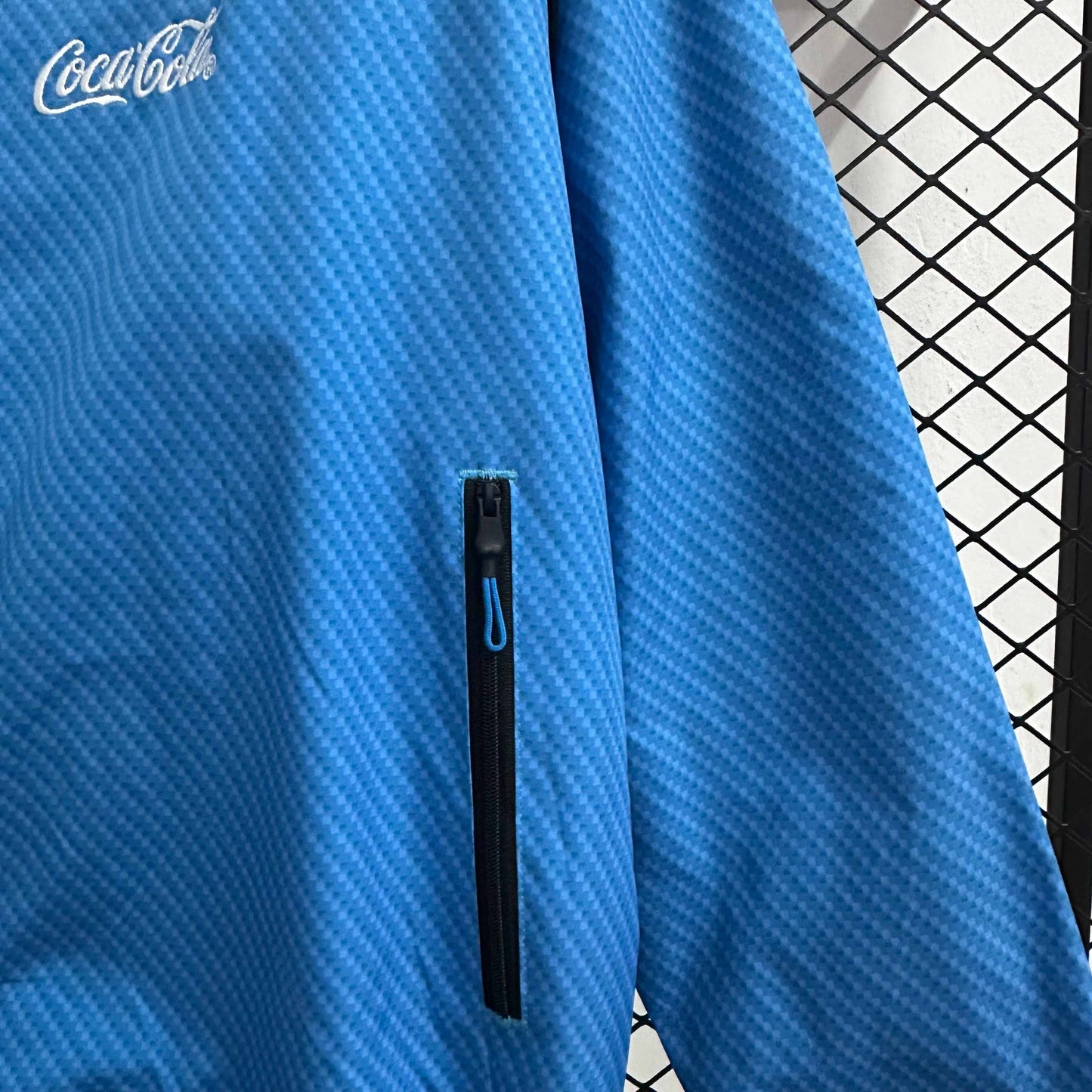 Cortavientos impermeable azul Napoli 2026-27 S-2XL