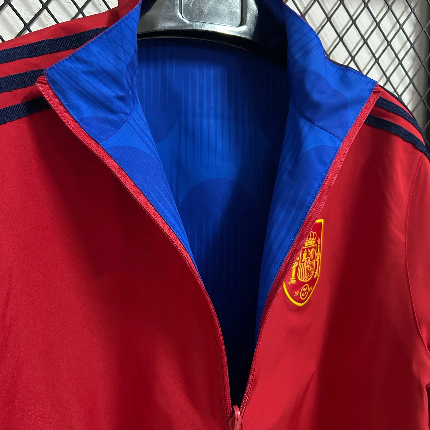 2026 España Cortavientos reversible rojo y azul S-2XL