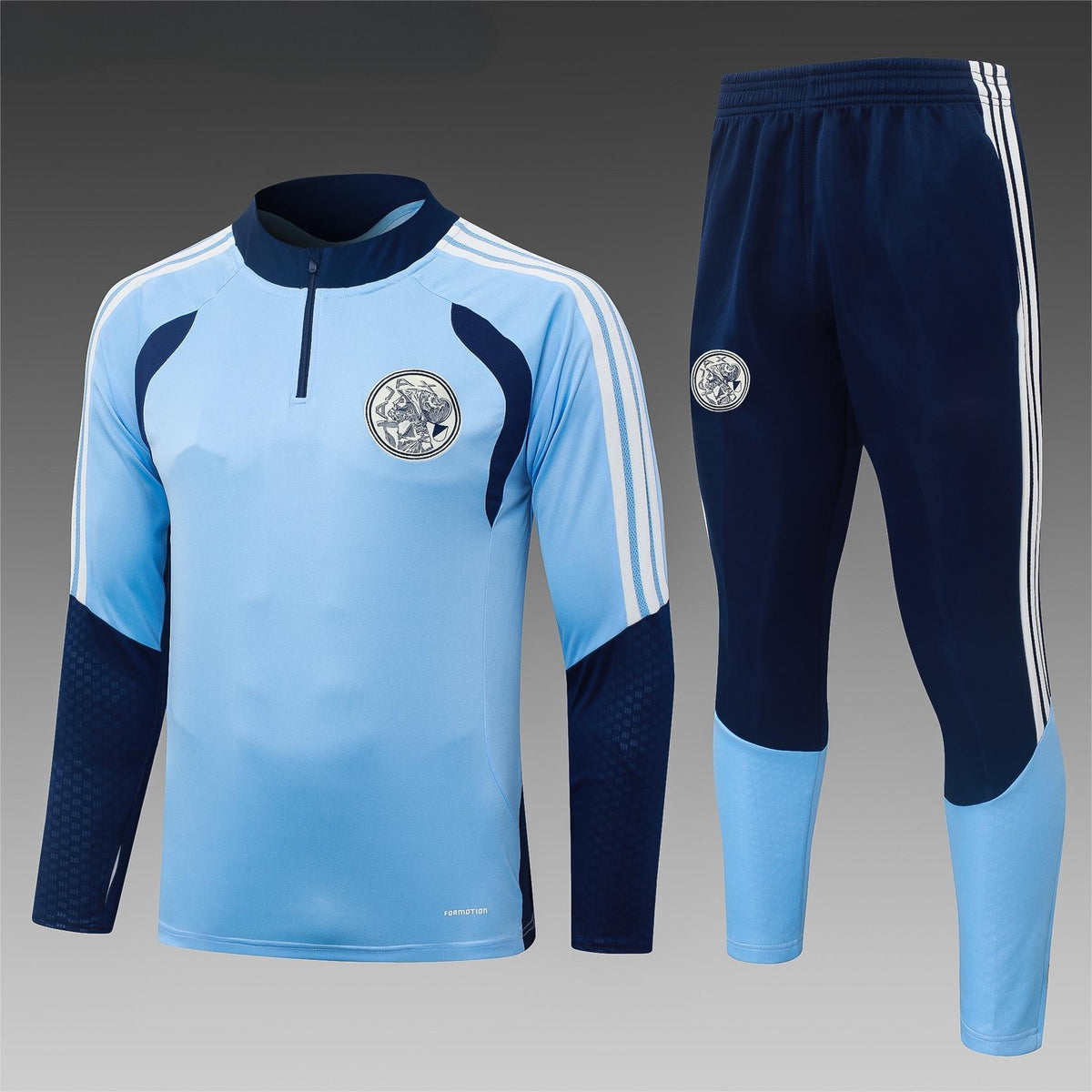 2026-27 Ajax Light Blue Half Zip Training Suit Adults Or Children